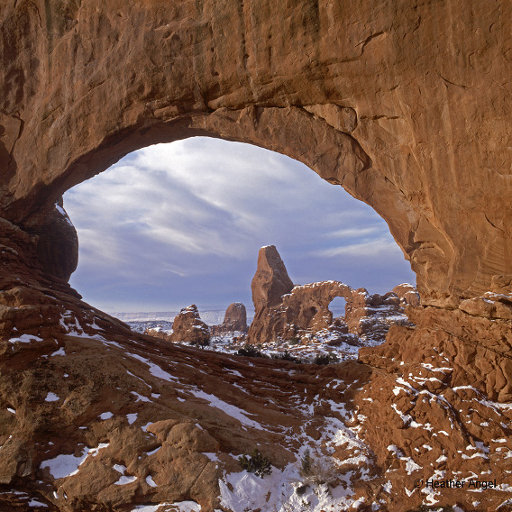 Consider composition Arch of North Window frames Turret Arch Arches National Park Utah USA